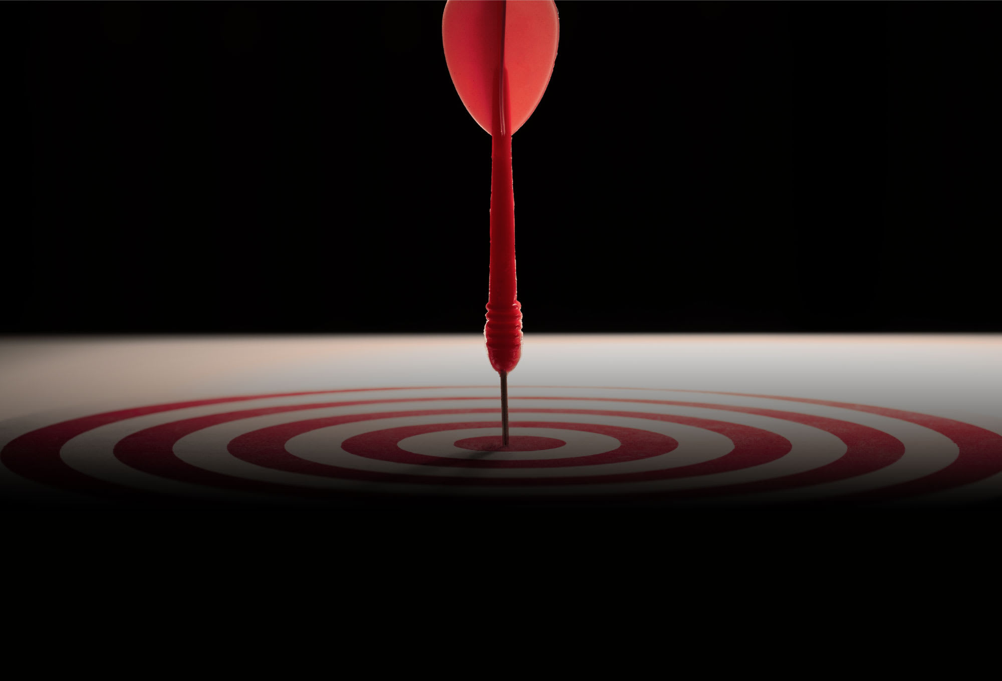 a dart hitting bullseye